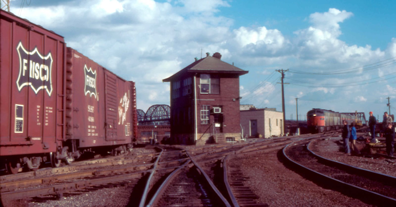 Amtrak 407 waits for a freight to clear